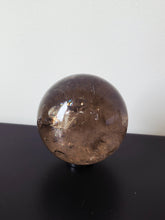 Load image into Gallery viewer, Rainbow Smokey Quartz Sphere 580g S216