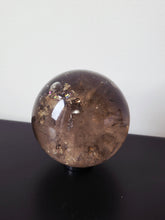 Load image into Gallery viewer, Rainbow Smokey Quartz Sphere 580g S216