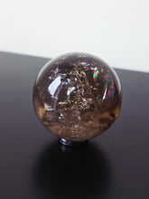 Load image into Gallery viewer, Rainbow Smokey Quartz Sphere 355g S219