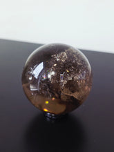 Load image into Gallery viewer, Rainbow Smokey Quartz Sphere 355g S219