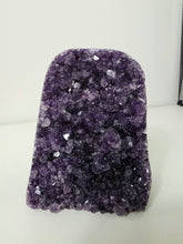 Load image into Gallery viewer, Amethyst crystal on a white surface