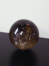 Load image into Gallery viewer, Rainbow Smokey Quartz Sphere 960g S217
